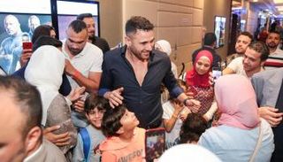 أحمد عز خلال عرض فيلم "الممر" في دبي