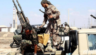 مسلحون من مليشيات السراج في ليبيا- أرشيفية 