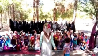 لقطة من الفيديو المتداول للأطفال التابعين لأردوغان