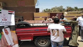 قافلة المساعدات لدى وصولها إلى نجع الفتاتيح بالأقصر 