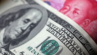 مصرفيون صينيون يحذرون من حرب عملات