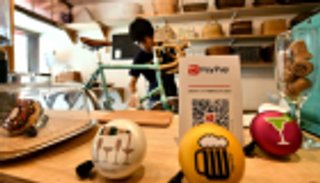 اليابانيون لا يثقون في التعامل مع الصراف الآلي