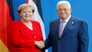 الرئيس الفلسطيني محمود عباس والمستشارة الألمانية أنجيلا ميركل