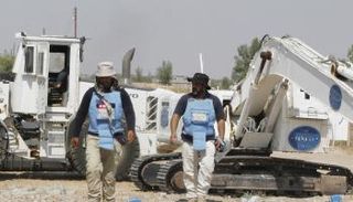 الألغام تحول مزارع بيجي العراقية إلى حقول موت