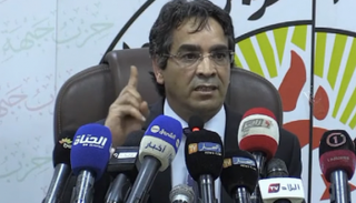 محمد جميعي الأمين العام للحزب الحاكم بالجزائر- أرشيفية