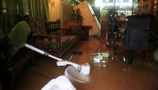 آثار عاصفة ممطرة تسببت فيها "كارين" في باراتاريا بترينيداد وتوباجو