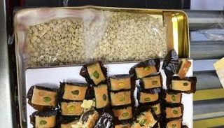 السلطات الأردنية تحبط محاولة تهريب المخدرات في علب حلويات