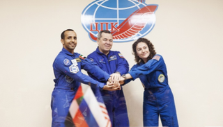 هزاع المنصوري وجيسيكا مير وأوليغ سكريبوتشكا