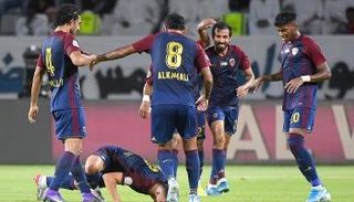 احتفال لاعبي الوحدة