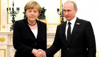 أنجيلا ميركل وفلاديمير بوتين في لقاء سابق