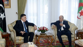 استقبال الرئيس الجزائري للسراج 