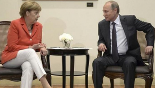 فلاديمير بوتين وأنجيلا ميركل في لقاء سابق