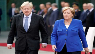 أنجيلا ميركل وبوريس جونسون - أرشيفية