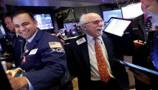 وول ستريت تغلق مرتفعة