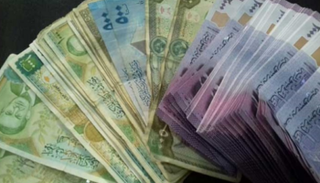 الليرة السورية تسقط لمستوى تاريخي أمام الدولار