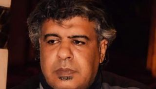 السياسي الليبي عادل ياسين 