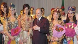 بوتفليقة في صورة له بيوم المرأة 