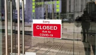 أحد المتاجر مغلق بسبب كورونا - أرشيفية