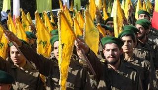 عناصر من مليشيا حزب الله اللبناني - أ.ف.ب