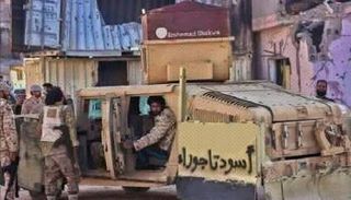 عناصر من مليشيا أسود تاجوراء في طرابلس