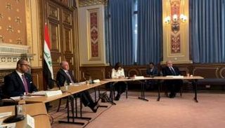 جانب من اجتماع مسؤولين عراقيين مع شركاء دوليين في لندن