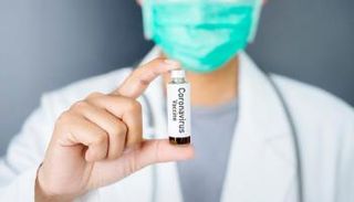 تم تعليق تجربة اللقاح مؤقتا بعد أن أصيب أحد المتطوعين بالمرض