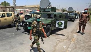 عناصر من قوات الأمن العراقية - أ.ف.ب