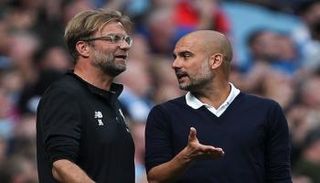 بيب جوارديولا مدرب مانشستر سيتي ويورجن كلوب مدرب ليفربول