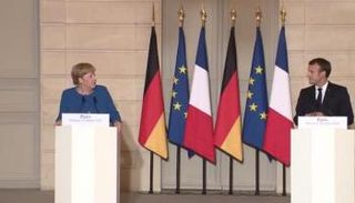 ماكرون وميركل في قمة سابقة - أرشيفية