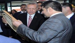 صورة تجمع أردوغان مع حسين بويوكفيرات