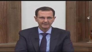 الرئيس السوري بشار الأسد خلال إلقاء كلمته