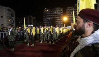 عناصر من مليشيا حزب الله اللبناني - أ.ف.ب