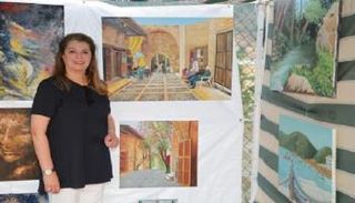 الفنانة التشكيلية الكويتية منى الغربللي