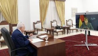 جانب من اللقاء الافتراضي بين ميركل وعباس 