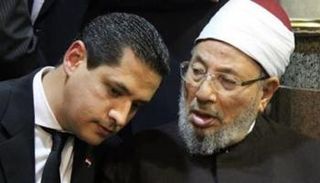 عبدالرحمن يوسف ووالده القرضاوي مفتي الإرهاب 