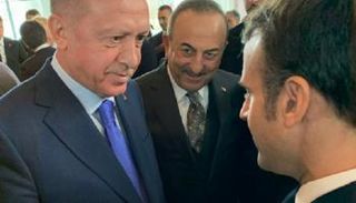 لقاء سابق بين أردوغان وماكرون