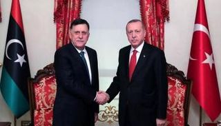 رجيب طيب أردوغان في لقاء سابق مع فايز السراج