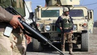 قوة أمنية عند العاصمة بغداد - أرشيفية