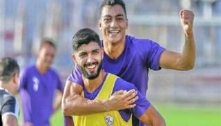 فرجاني ساسي مع مصطفى محمد 