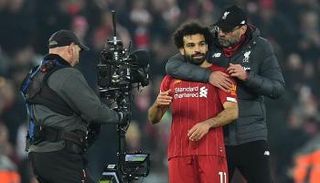 محمد صلاح نجم ليفربول ومدربه يورجن كلوب