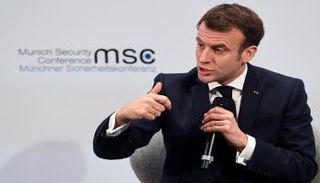 الرئيس الفرنسي إيمانويل ماكرون في ميونخ - رويترز