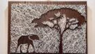 بالمسامير والحب..مصرية تبدع لوحات فنية