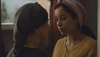 ‎⁨نسرين الراضي في مشهد من فيلم آدم⁩