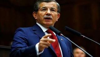 أحمد داود أوغلو مهنئا باباجان على تأسيس الحزب