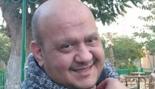 الشاعر الغنائي سامح العجمي