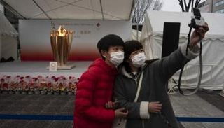 اليابانيون والشعلة الأولمبية