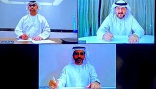 جانب من توقيع الاتفاقية بين 