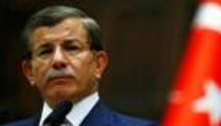 داود أوغلو: قانون أردوغان "عفو سري" عن الفاسدين