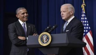 الرئيس الأمريكي السابق ونائبه جون بايدن - أ.ف.ب