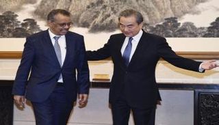 رئيس منظمة الصحة العالمية ووزير خارجية الصين - أرشيفية